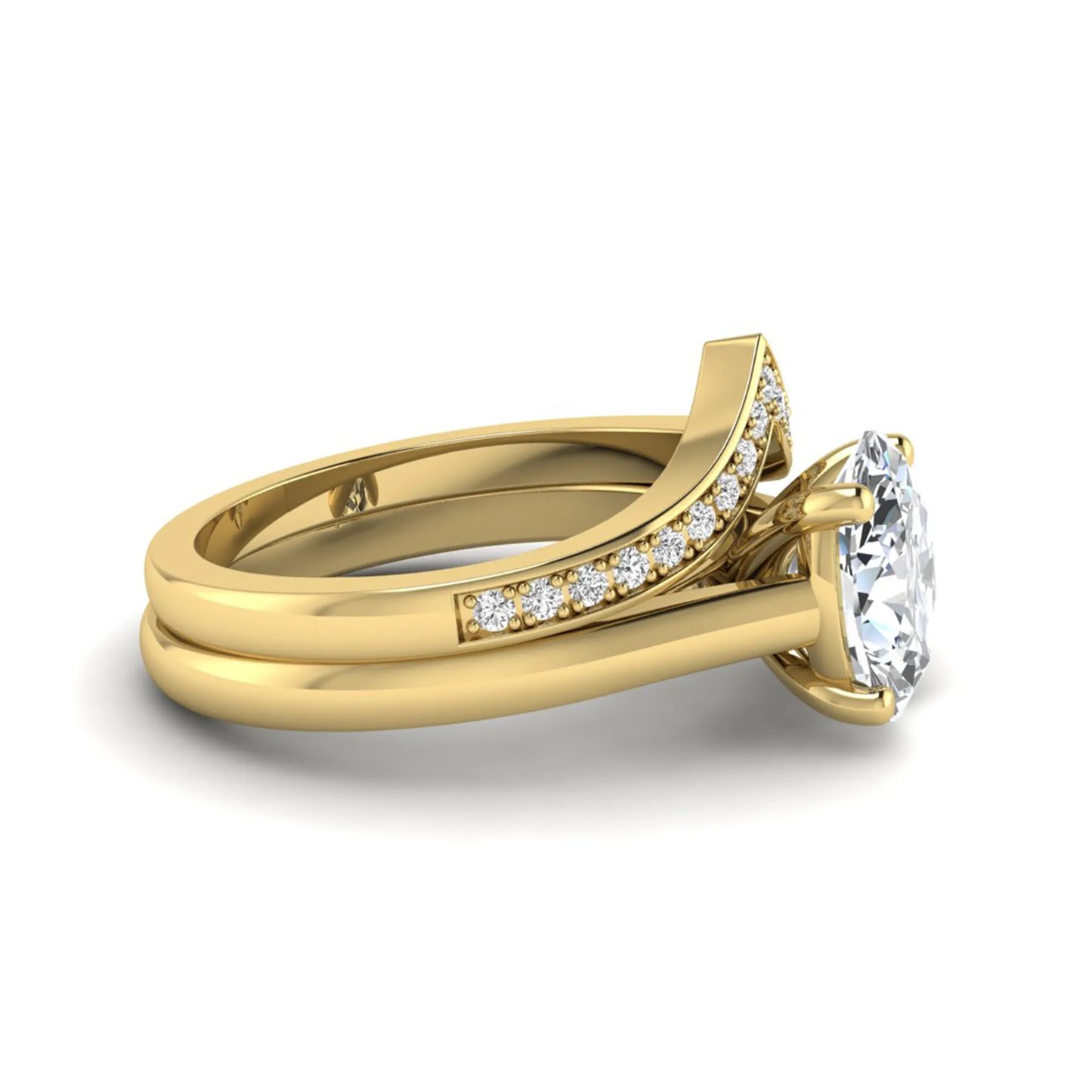 Oval cut lab grown diamond bridal ring set featuring a four-prong solitaire engagement ring with a pavé chevron V-shaped wedding band in a yellow gold finish.