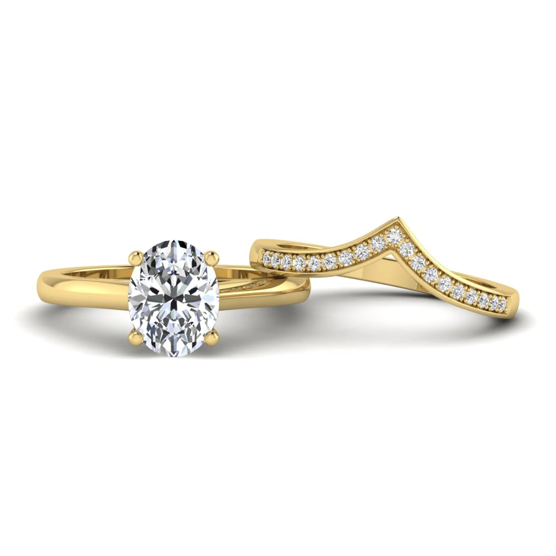 Oval cut lab grown diamond bridal ring set featuring a four-prong solitaire engagement ring with a pavé chevron V-shaped wedding band in a yellow gold finish.