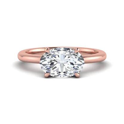 IGI Certified 1.45 carat oval cut lab grown diamond solitaire engagement ring with a polished rose gold band.