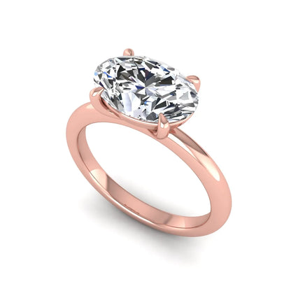IGI Certified 1.45 carat oval cut lab grown diamond solitaire engagement ring with a polished rose gold band.