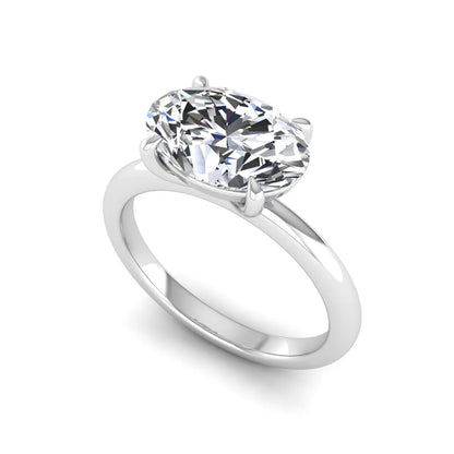 IGI Certified 1.45 carat oval cut lab grown diamond solitaire engagement ring with a polished white gold band.