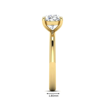 IGI Certified 1.45 carat oval cut lab grown diamond solitaire engagement ring with a polished yellow gold band.