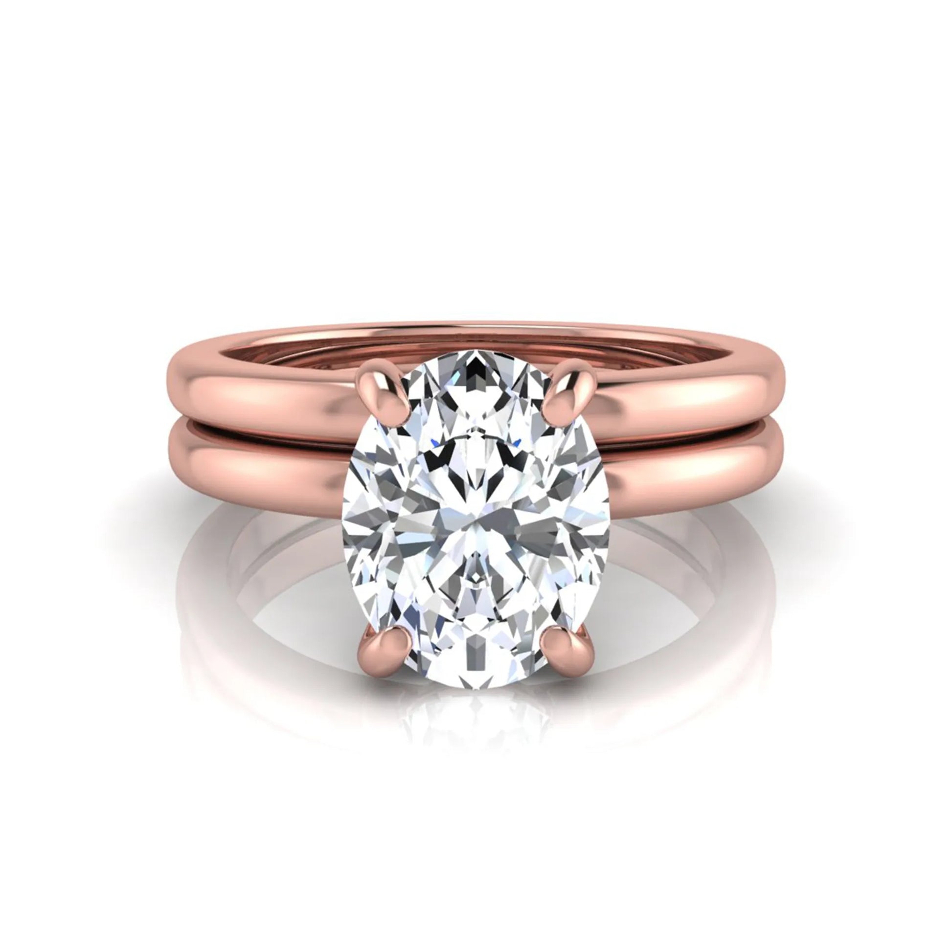 Oval cut lab grown diamond solitaire engagement ring with a matching plain gold wedding band in rose gold
