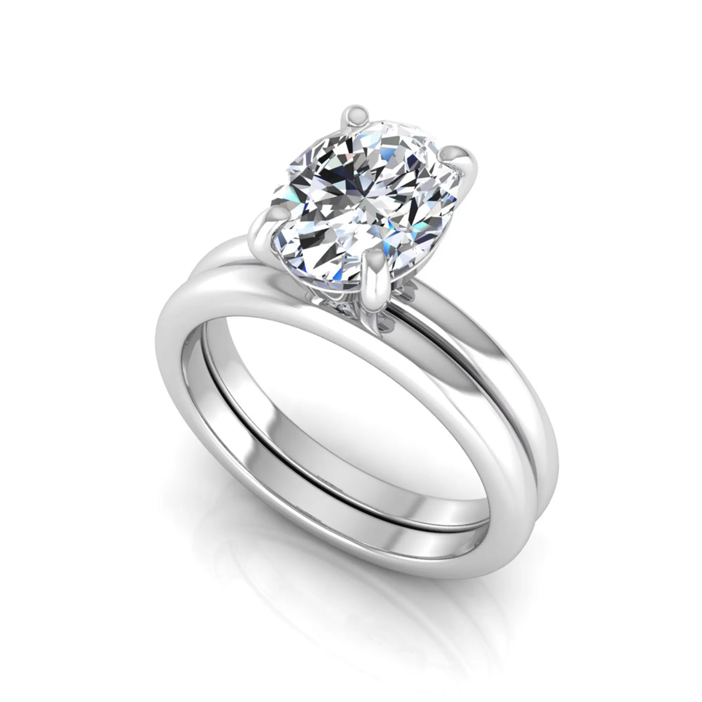 Oval cut lab grown diamond solitaire engagement ring with a matching plain gold wedding band in white gold