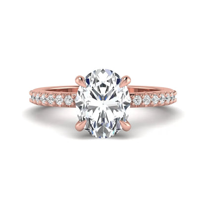 IGI Certified 1.90 carat oval cut lab grown diamond solitaire engagement ring with round pavé diamonds in rose gold.