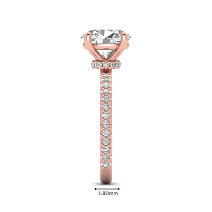 IGI Certified 1.90 carat oval cut lab grown diamond solitaire engagement ring with round pavé diamonds in rose gold.