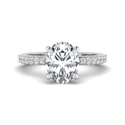 IGI Certified 1.90 carat oval cut lab grown diamond solitaire engagement ring with round pavé diamonds in white gold.