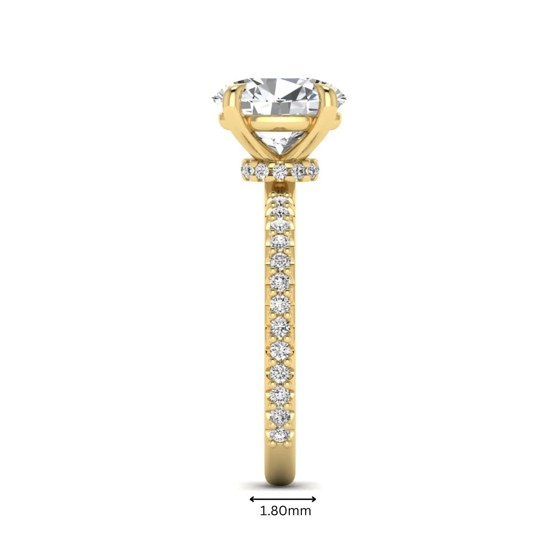 IGI Certified 1.90 carat oval cut lab grown diamond solitaire engagement ring with round pavé diamonds in yellow gold.