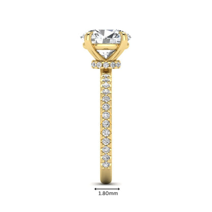 IGI Certified 1.90 carat oval cut lab grown diamond solitaire engagement ring with round pavé diamonds in yellow gold.