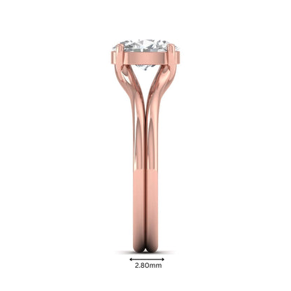 IGI certified 1.22 carat oval cut lab grown diamond solitaire engagement ring with elegant split shank in rose gold.