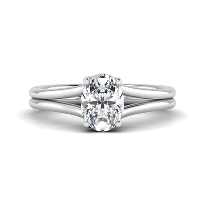 IGI certified 1.22 carat oval cut lab grown diamond solitaire engagement ring with elegant split shank in white gold.