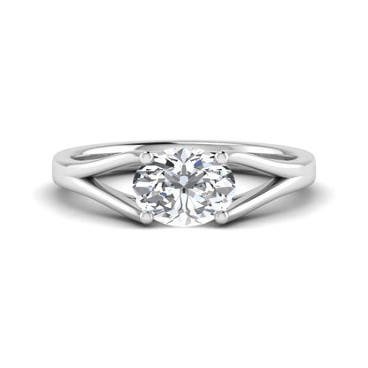 Oval Split Shank Lab Grown Diamond Engagement Ring featuring a 9.00 × 7.00 mm oval-cut center diamond in a four-prong setting with an elegant split shank band in white gold