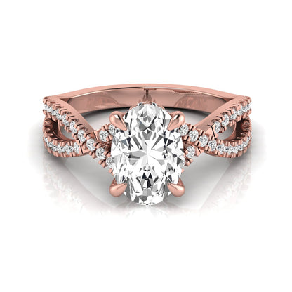 Oval cut lab grown diamond engagement ring featuring a four-prong setting, pavé split shank band, hidden accent diamonds, and a polished rose gold tone finish.