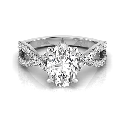 Oval cut lab grown diamond engagement ring featuring a four-prong setting, pavé split shank band, hidden accent diamonds, and a polished white gold tone finish.