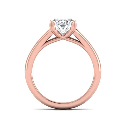 Oval cut lab grown diamond solitaire engagement ring with split shank design and rose gold tone prong setting.