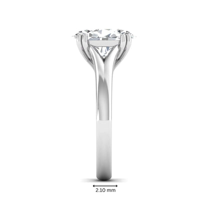 Oval cut lab grown diamond solitaire engagement ring with split shank design and white gold tone prong setting.