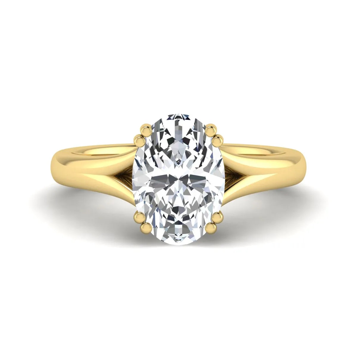 Oval cut lab grown diamond solitaire engagement ring with split shank design and yellow gold tone prong setting.