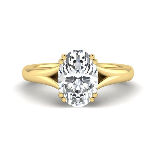Oval cut lab grown diamond solitaire engagement ring with split shank design and yellow gold tone prong setting.