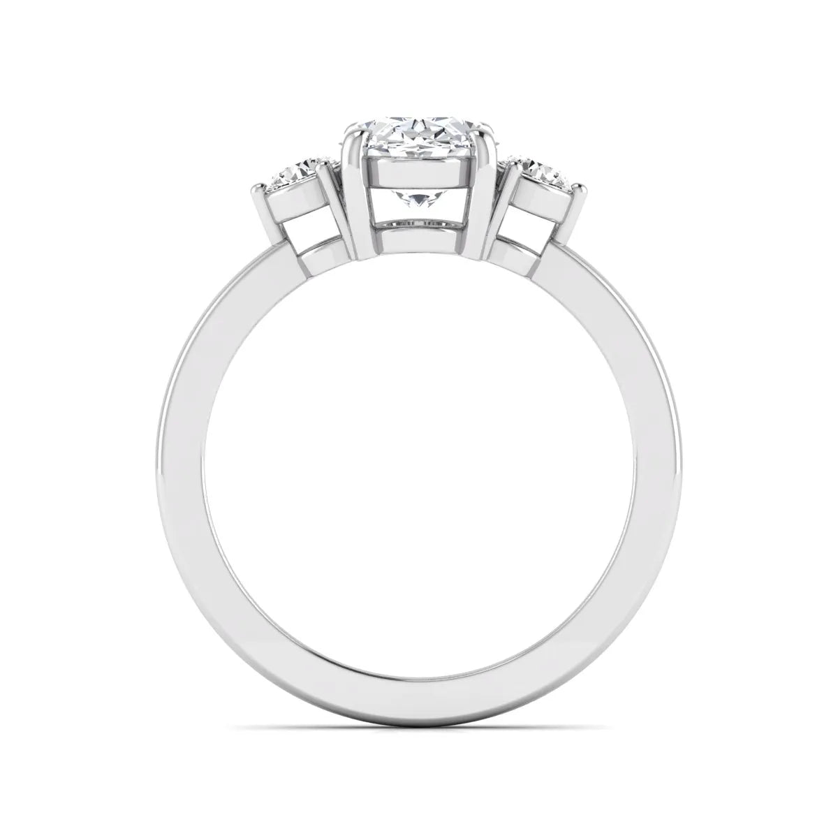 Oval cut three stone lab grown diamond engagement ring featuring a 1.21 carat IGI certified center diamond with round side diamonds in white gold.