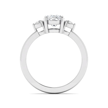 Oval cut three stone lab grown diamond engagement ring featuring a 1.21 carat IGI certified center diamond with round side diamonds in white gold.