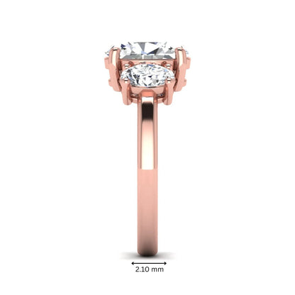 Oval cut three stone lab grown diamond engagement ring featuring an IGI certified center diamond with matching oval side diamonds in rose gold.