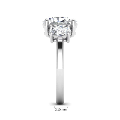 Oval cut three stone lab grown diamond engagement ring featuring an IGI certified center diamond with matching oval side diamonds in white gold.