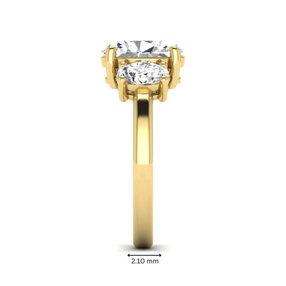 Oval cut three stone lab grown diamond engagement ring featuring an IGI certified center diamond with matching oval side diamonds in yellow gold.