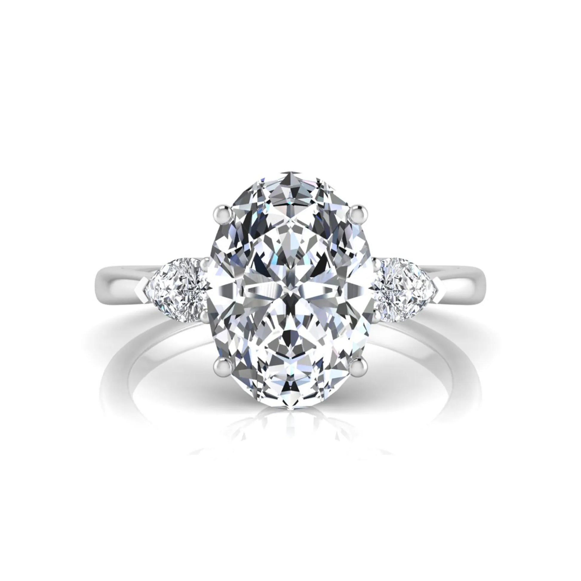 Oval three stone lab grown diamond engagement ring featuring a 1.86 carat IGI certified oval cut center diamond with pear cut side diamonds in a white gold design.