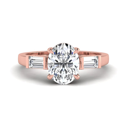 IGI Certified 1.86 carat oval cut lab grown diamond three stone engagement ring with baguette side diamonds in rose gold.