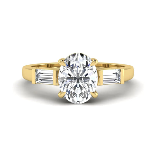 IGI Certified 1.86 carat oval cut lab grown diamond three stone engagement ring with baguette side diamonds in yellow gold.