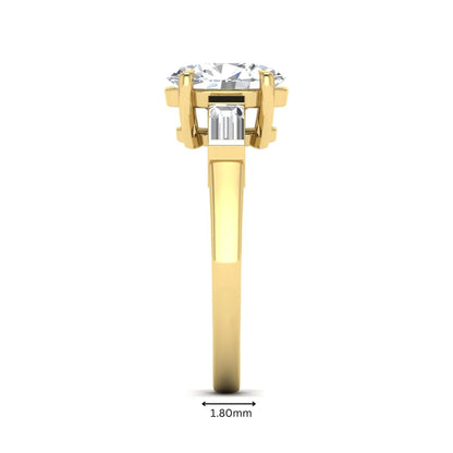 IGI Certified 1.86 carat oval cut lab grown diamond three stone engagement ring with baguette side diamonds in yellow gold.