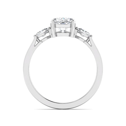 Oval cut lab grown diamond three stone engagement ring with marquise side diamonds in a prong setting featuring a white gold tone design.