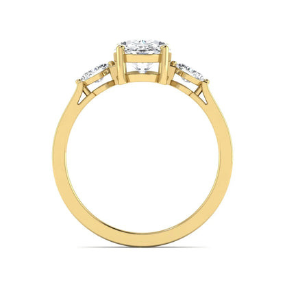 Oval cut lab grown diamond three stone engagement ring with marquise side diamonds in a prong setting featuring a yellow gold tone design.