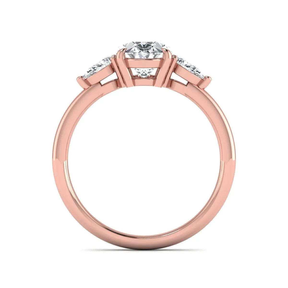 Oval cut lab grown diamond three stone engagement ring with pear side diamonds in a prong setting featuring a rose gold tone design.