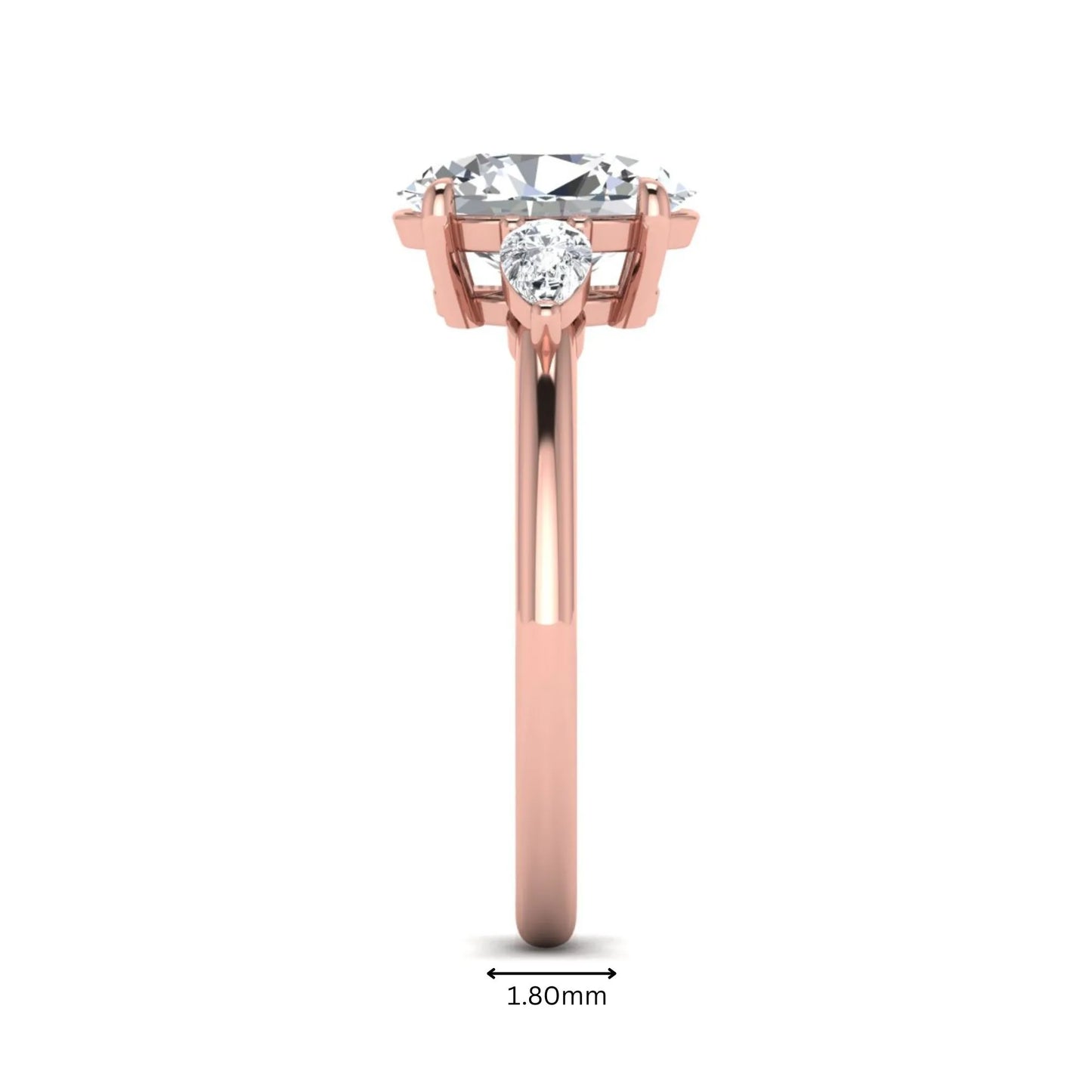 Oval cut lab grown diamond three stone engagement ring with pear side diamonds in a prong setting featuring a rose gold tone design.
