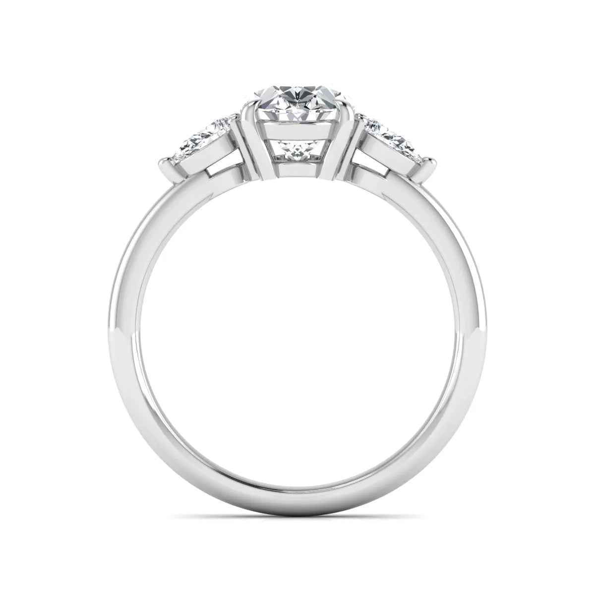 Oval cut lab grown diamond three stone engagement ring with pear side diamonds in a prong setting featuring a white gold tone design.