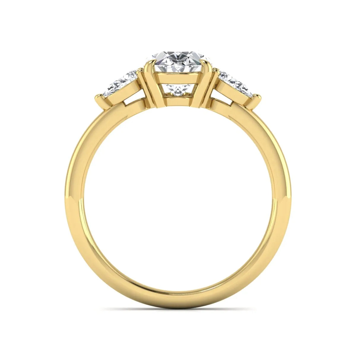 Oval cut lab grown diamond three stone engagement ring with pear side diamonds in a prong setting featuring a yellow gold tone design.
