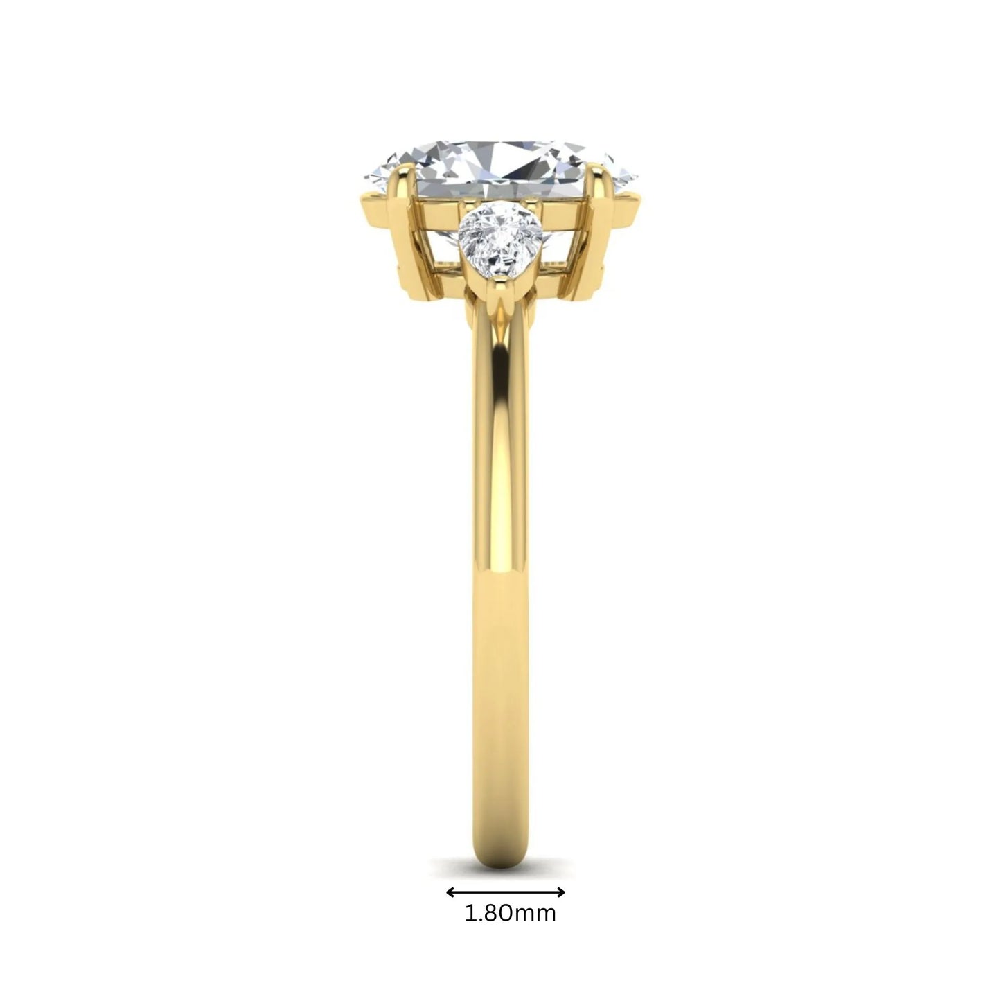 Oval cut lab grown diamond three stone engagement ring with pear side diamonds in a prong setting featuring a yellow gold tone design.