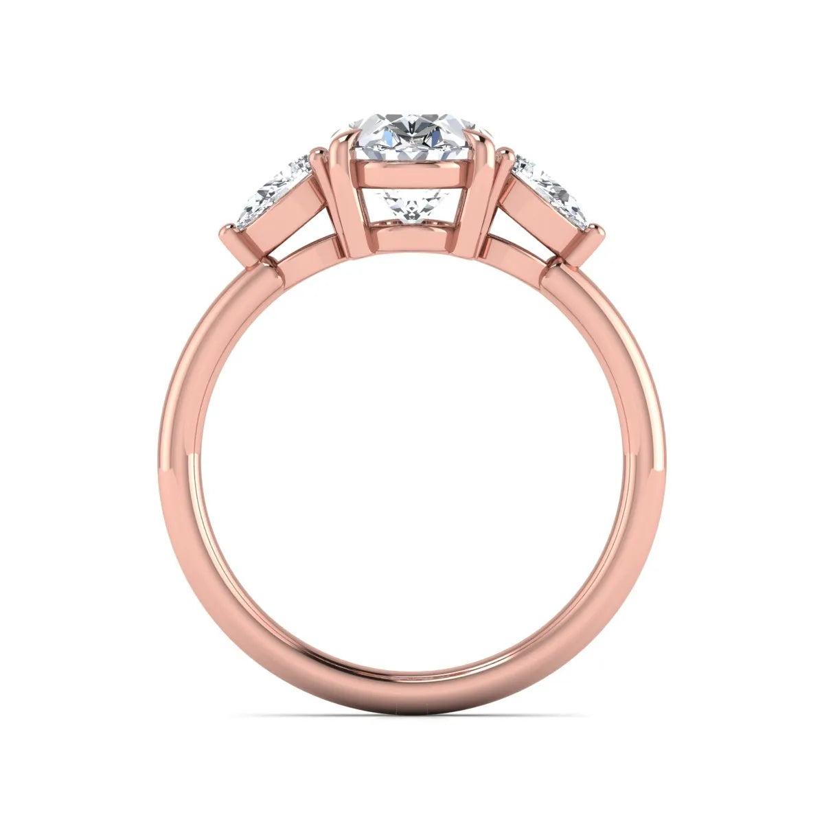 Oval cut lab grown diamond three stone engagement ring with pear cut side diamonds in a prong setting on a polished rose gold band.
