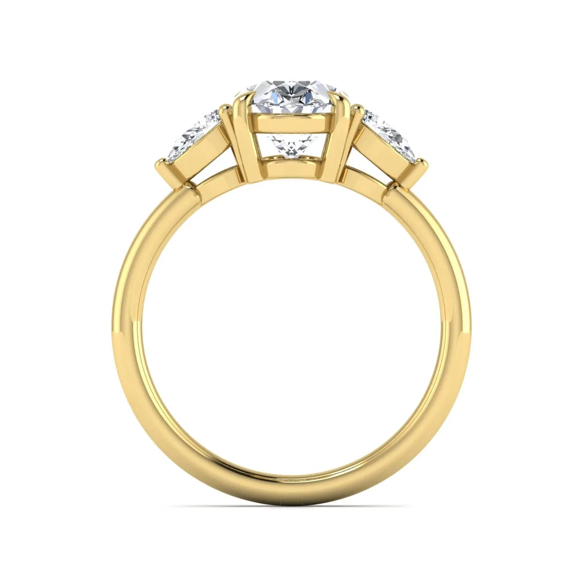 Oval cut lab grown diamond three stone engagement ring with pear cut side diamonds in a prong setting on a polished yellow gold band.