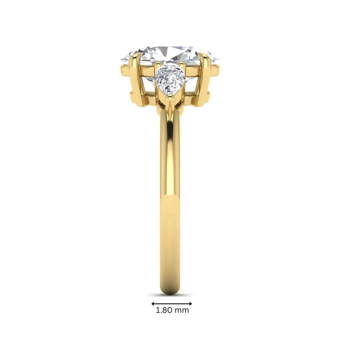 Oval cut lab grown diamond three stone engagement ring with pear cut side diamonds in a prong setting on a polished yellow gold band.