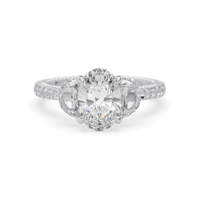 Oval three stone pavé lab grown diamond engagement ring with round and half moon side diamonds in white gold