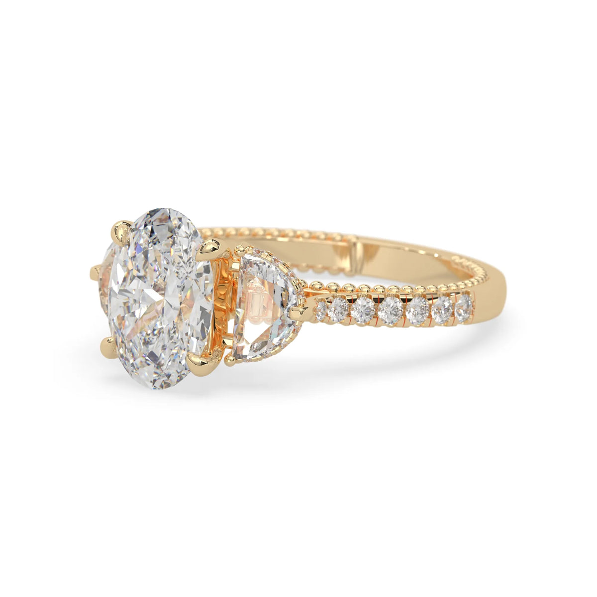 Oval three stone pavé lab grown diamond engagement ring with round and half moon side diamonds in yellow gold
