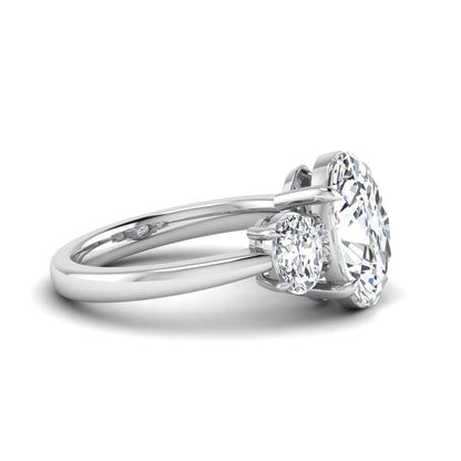 Oval three stone prong set lab grown diamond engagement ring featuring a 3.00 carat oval center diamond with matching oval side diamonds in white gold finish.