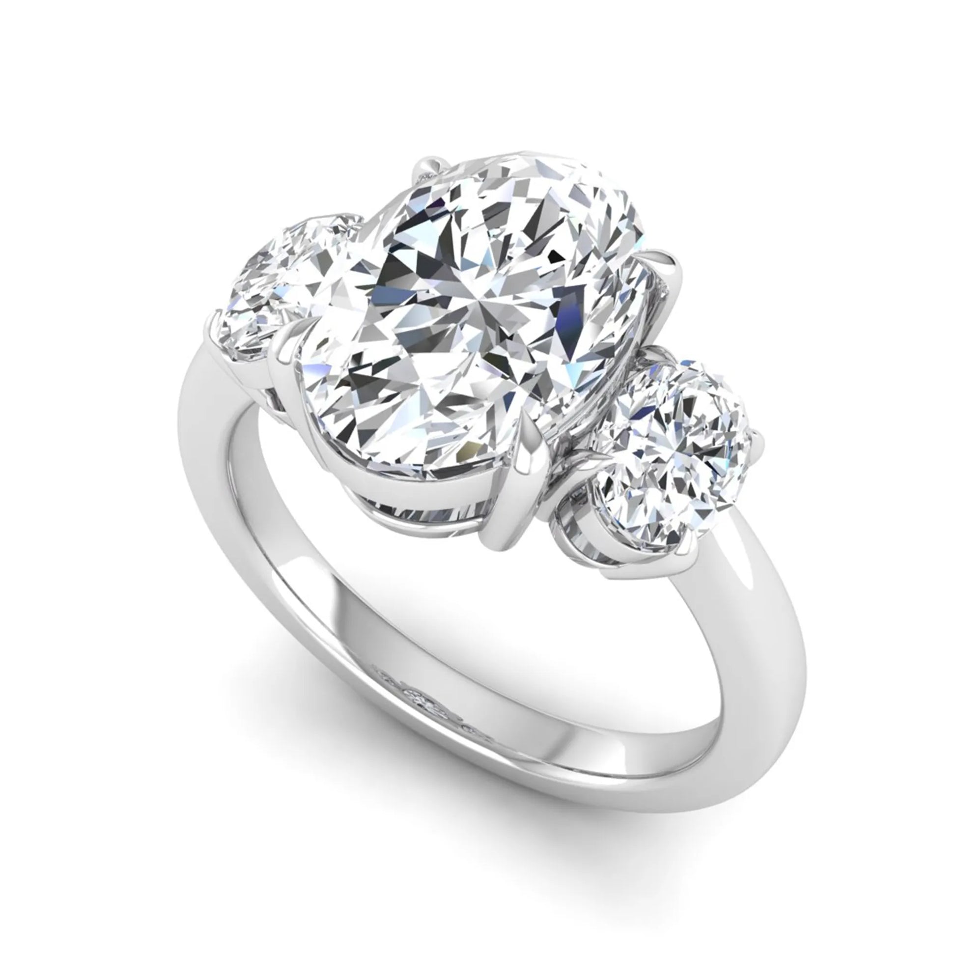 Oval three stone prong set lab grown diamond engagement ring featuring a 3.00 carat oval center diamond with matching oval side diamonds in white gold finish.