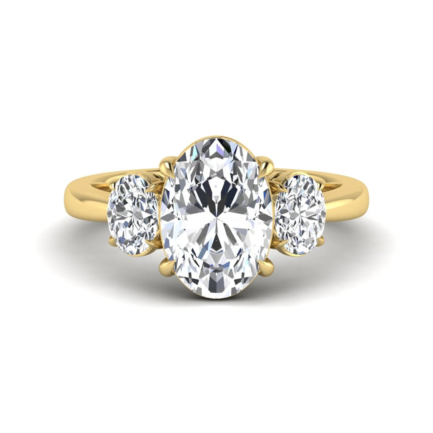 Oval three stone prong set lab grown diamond engagement ring featuring a 3.00 carat oval center diamond with matching oval side diamonds in yellow gold finish.