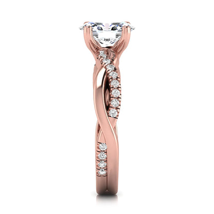 Oval cut lab grown diamond engagement ring featuring a 1.21 carat center diamond in a four-prong setting with a twisted pavé accent band and polished rose gold finish.