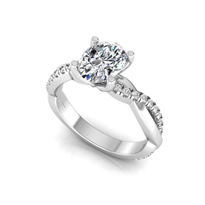 Oval cut lab grown diamond engagement ring featuring a 1.21 carat center diamond in a four-prong setting with a twisted pavé accent band and polished white gold finish.