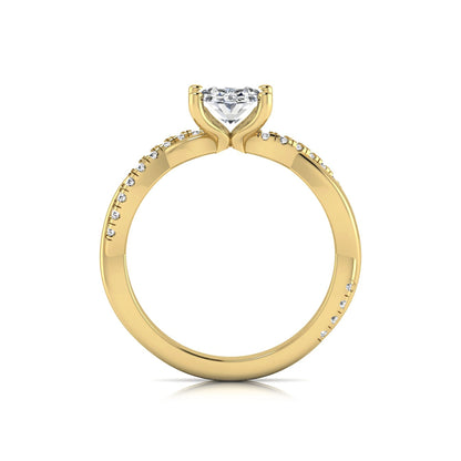 Oval cut lab grown diamond engagement ring featuring a 1.21 carat center diamond in a four-prong setting with a twisted pavé accent band and polished yellow gold finish.