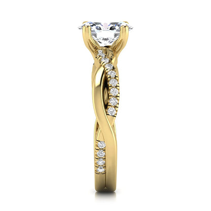 Oval cut lab grown diamond engagement ring featuring a 1.21 carat center diamond in a four-prong setting with a twisted pavé accent band and polished yellow gold finish.